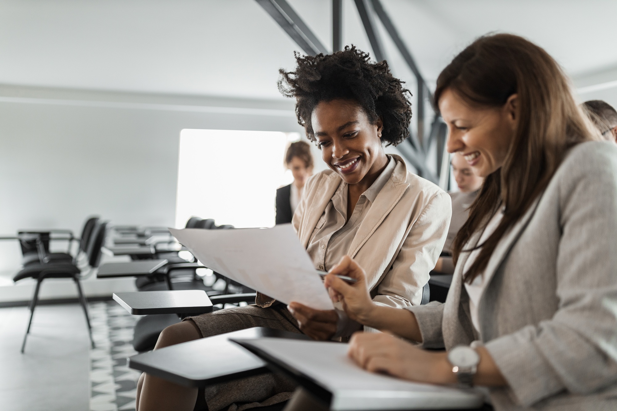 Having meeting, talking about new ideas.